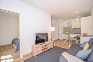 Acolhedor Apartamento de 1 Quarto com Terraço - Parede - 0
