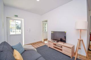 Acolhedor Apartamento de 1 Quarto com Terraço - Parede - 1