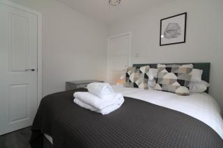 Signature - Caldercruix House - 2