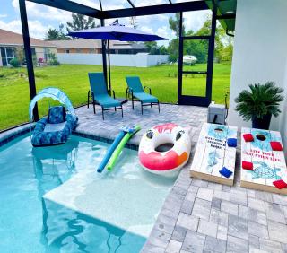 Perfect Oasis Retreat ! 2023 Luxury Built Home, Heated Pool and Games - Cape Coral - 5