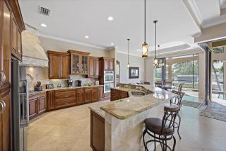 Opulent waterfront home with pool, spa, dock and deck - 4