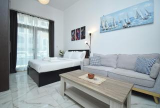 Modern fully equipped studio with terrace - Joya Verde - JVC - Dubai - 8