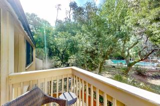 2-story condo with on-site pool, private patio, & W/D - near beach/golf - 1