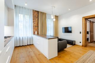 Two Bedroom Very Berry Apartment in Poznań with Desk by Noclegi Renters - Poznan - 1
