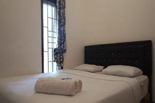 RedDoorz Syariah at Galliano Homestay Bukittinggi - Bukittinggi - 9