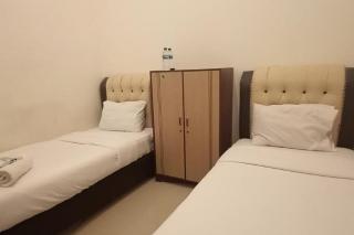 RedDoorz Syariah at Galliano Homestay Bukittinggi - Bukittinggi - 8