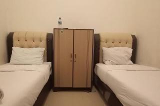 RedDoorz Syariah at Galliano Homestay Bukittinggi - Bukittinggi - 1