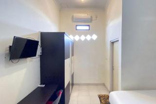 RedDoorz Syariah @ Jalan Jendral Sudirman Pekanbaru - Pekanbaru - 3