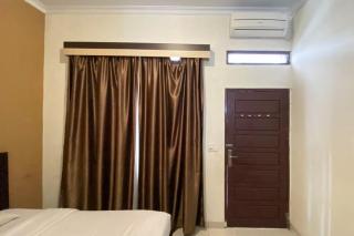 RedDoorz Syariah @ Jalan Jendral Sudirman Pekanbaru - Pekanbaru - 1