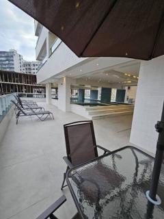 condominio clube com piscina climatizada com fechamento em vidro - Vila Caiçara - Praia Grande 4 adultos e 1 criança até 12 anos - Praia Grande - 6