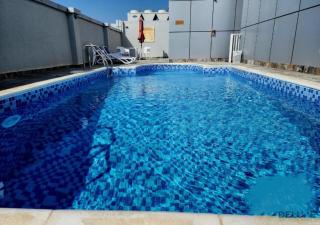 Ritzy 1BR at Global Golf Residence 2 Sports City by Deluxe Holiday Homes - Dubai - 2