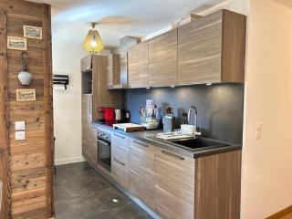 Appartement neuf, luxueux, au cœur des Gets avec terrasse, parking sécurisé, proche commerces et pistes. - FR-1-623-116 - Les Gets - 8