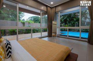 StayVista's Rosso with Outdoor Pool, Theatre-Disc Room & Games Room - 1
