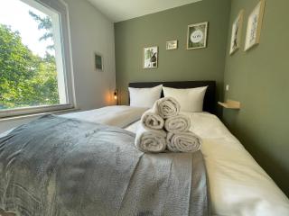 Vorstadtoase - 3 Personen - Apartment mit Queensize-Bett, Badewanne, Schlafcouch, Parken, Netflix, Nähe BER - Eichwalde - 4