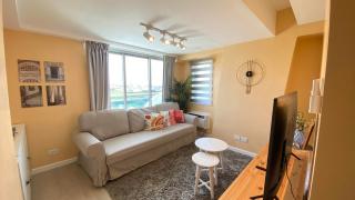 Two Bedroom with Balcony by The Bali Corner at Azure North , POOL and BEACH VIEW - unit with Bathtub - 1