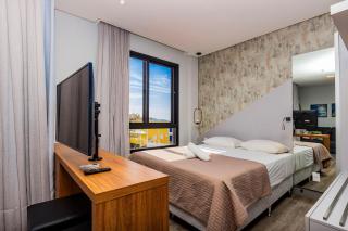 Aion Suites 205 – Lindo apartamento com Vista para o Mar, a 60m da Praia de Bombinhas, com Piscina e Academia no Rooftop. - Bombinhas - 7