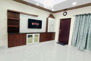 TrueLife Homestays - Chinmai Nivas - Modern 2BHK homes for family - Tirumala Mountain View - Best Peaceful Location - Many restaurants nearby - Large hall, AC bedrooms, Modular Kitchen - Fast WiFi - Android TV - 250 Jio Channels - Tirupati - 5