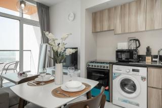 StoneTree - Cozy Fully-Furnished 1 BR in Damac Hills - Dubai - 6