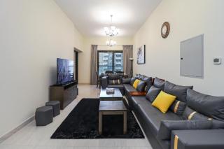Relaxing 4BR Stay I Gym, Spa & Pool Access - Dubai - 0