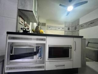 Apartamento Condomínio Wembley Tênis de frente à praia - 5