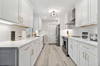 Waterfront 4BR Home with Heated Pool, Boat Lift, Free Parking, Near Beach, Sleeps 11! - 4