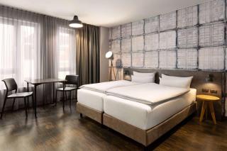 Vienna House Easy by Wyndham Bremen City Apartments - Brema - 9