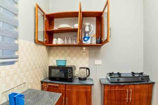 Cozy & Stylish 1-Bedroom Apartment by Havana Properties located in Kinondoni Vijana - 4