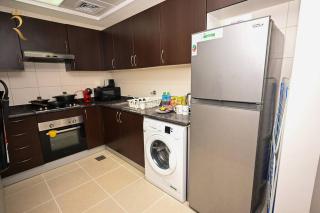 Radiant 1BR Apartment - Bright Living in Al Reem, Near Reem Mall - 2