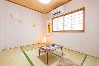 駐車場無料!静かな住宅街 4つの寝室でご家族でゆっくりお過ごし頂けます 7台の寝具で最大11名様まで - Osaca - 5