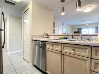 Stunning 22 Condo with peek-a-boo views of the ocean across the street. OW1-505 - New Smyrna Beach - 1