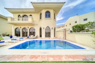 Premier 6BR Villa with Assistant's Room and Private Pool in Frond E Palm Jumeirah by Deluxe Holiday Homes - 1