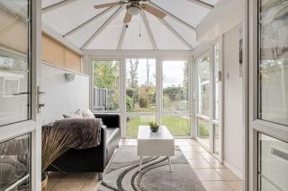 Comfortable and spacious home with free parking plenty of space large sun trap garden and crisp white hotel linen hosted by Our Home Short Stays - 1