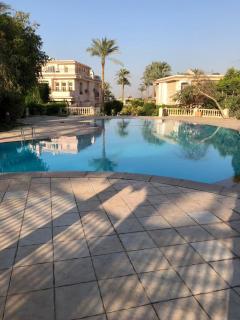 Ground floor villa with private garden, parking and shared swimming pool - Al ‘Ajūzah - 1