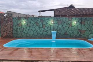 linda casa com piscina única no terreno - Guaratuba - 1