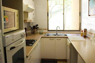 Departamento con vista al mar y jardín privado - 1