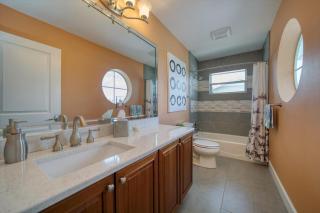 Waterfront Luxury w/ Heated Salt Pool & Golf Cart - 5