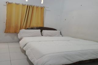 SPOT ON 93375 Elang Homestay - Parit - 8
