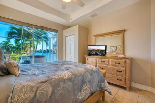 VILLA SUENO AMERICANO - 3 BEDS - 3 BATHS - 6 GUESTS - GULF ACCESS & POOL/SPA - INCL.10%OFF BOAT RENTAL - Cape Coral - 1