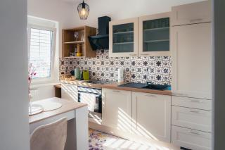 TAMLiving Graz Zentrum Balkon Küche Smart TV Ausblick - 9