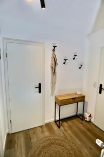 Nessmersiel, Renovierte Erdgeschosswohnung mit Garten, in Deichnähe, Wallbox, - 1