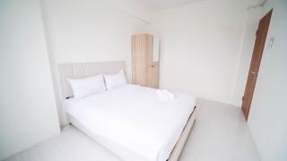 Best Choice 2BR at Puncak Dharmahusada Apartment Surabaya By Travelio - Surabaya - 9