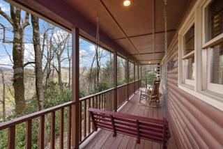 Log cabin on peaceful river - 2