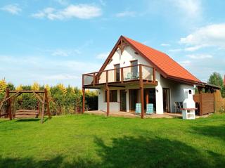 Dom z pięknymi widokami na jezioro ryńskie ilasy. - 9