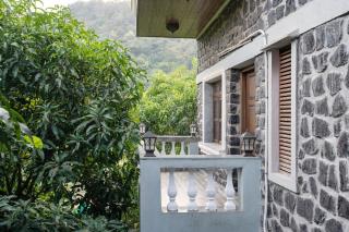 SaffronStays Peshwaai - 5BR Karjat villa with lawn pool & terrace plunge, mezzanine family rooms, near Songiri & Kondhana - 5