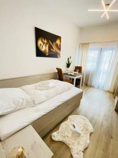 FeWo 20 - Appartement im Rottalblick - YoungModern wohnen mit Bademantelgang zur Therme, TV, Balkon und persönlichem Gästeempfang von Astarte Estate - Bad Griesbach im Rottal - 0