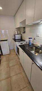 8 Depto de un dormitorio cochera - 9