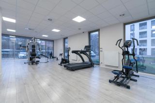 City Center Apartments with GYM & FREE GARAGE Poznań by Noclegi Renters - Poznań - 3