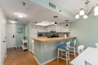 Beach views with top complex amenities and covered parking! - 6