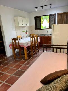 Casa amarela Sul na avenida da Praia da Ferrugem - 9