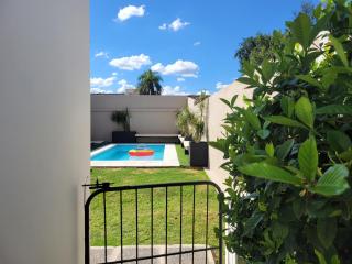 Casa Roque Funes, ubicado en Cerro de las Rosas Córdoba, Ofrece, Asador, Pileta, Cercanias, Estadio Kempes, aeropuerto Ambrosio Taravella, Orfeo Superdomo, Sanatorio Allende, Casa con 2 departamentos individuales y áreas comunes - Córdoba - 8
